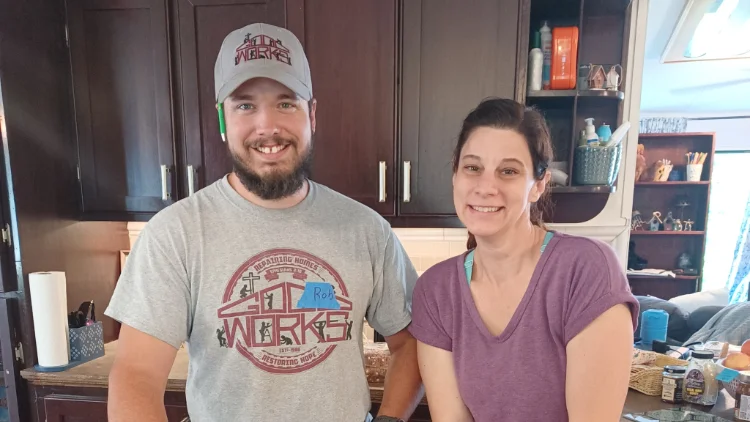 Rob Beaujean with a homeowner